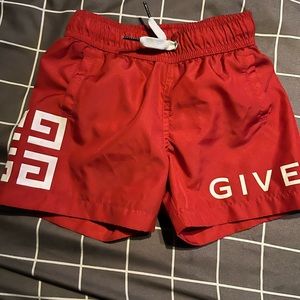 Toddler Givenchy Swim Trunks.